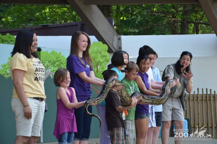 Adriana, Katie and Visitors with a Snake