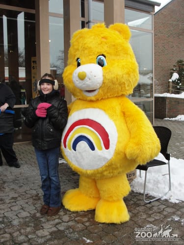 Visitor with Giant Care Bear at Noon Year's Eve